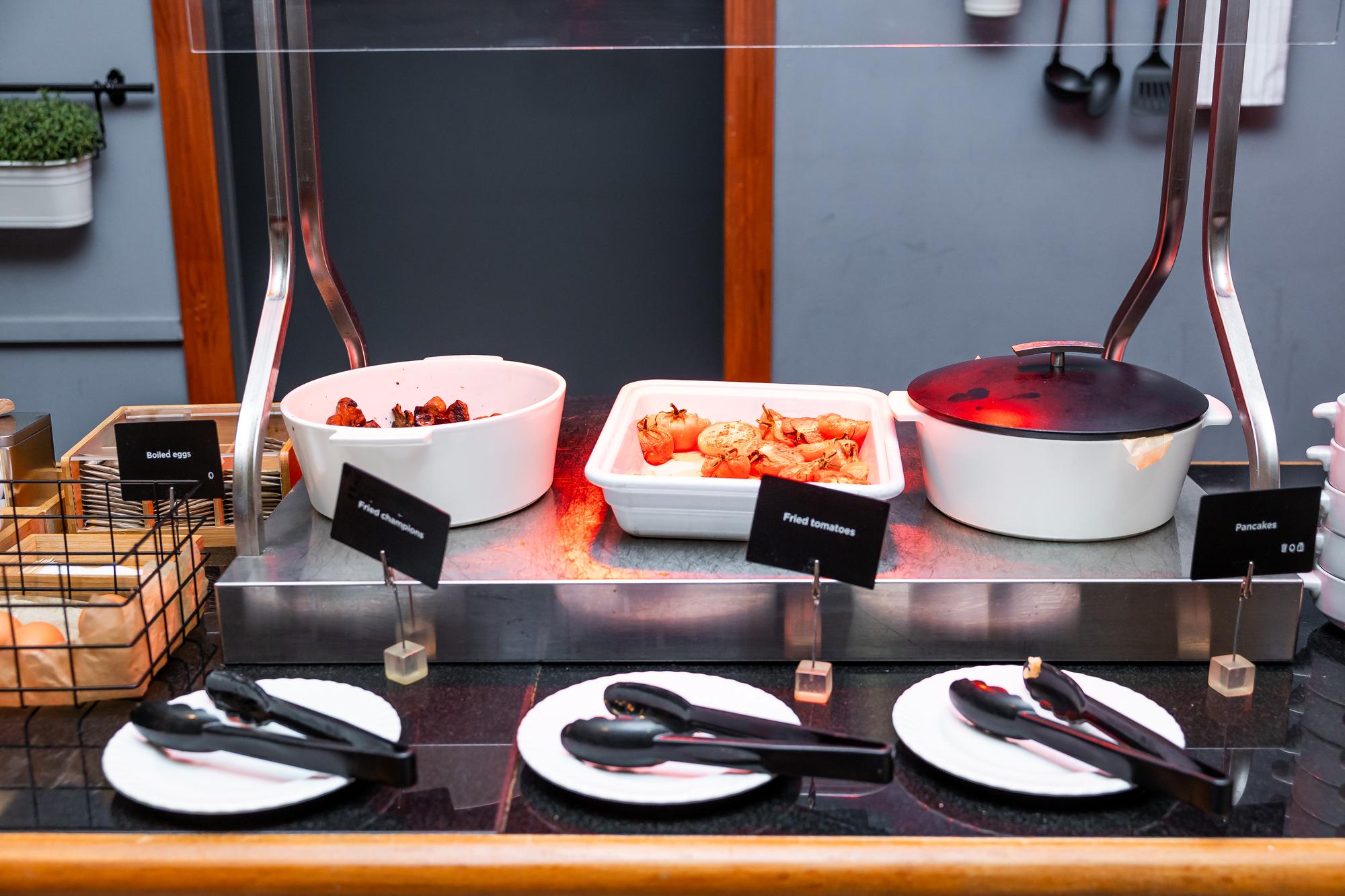 Workshop interior with cooking station and tech displays